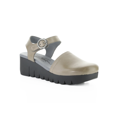 Taupe closed toe sandal with backstrap, grey footbed and a lugged black wedge platform.