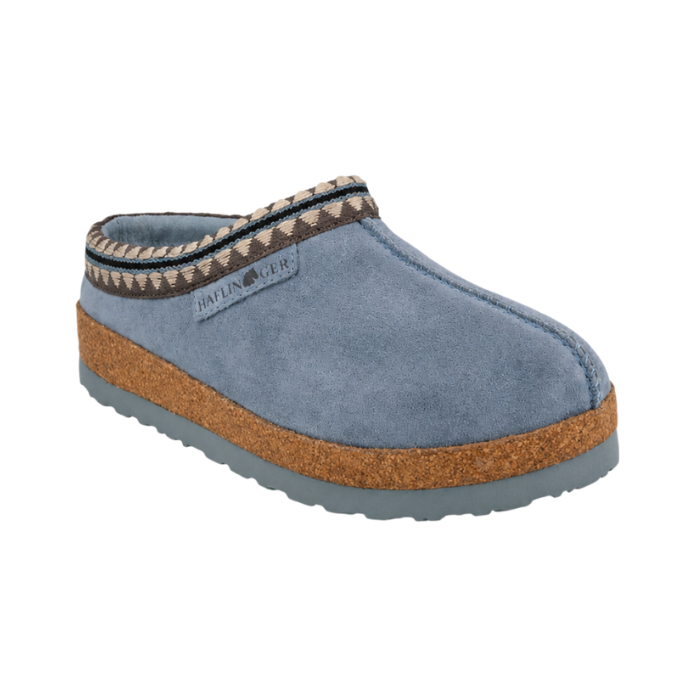 Blue platform suede clog with Aztec pattern cuff, cork midsole and blue EVA outsole.