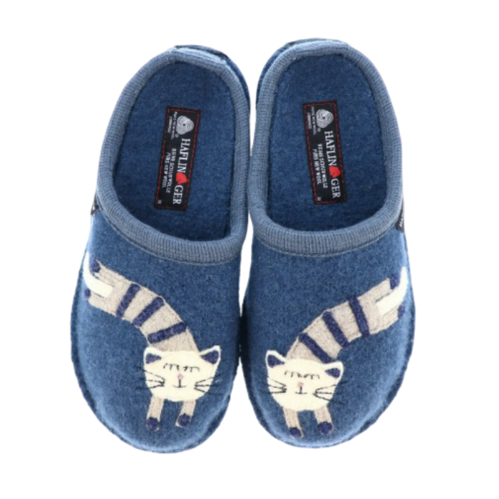 A pair of blue felt slip-on slippers with embroidered felt cat designs on the front, with Haflinger tag on the footbed.