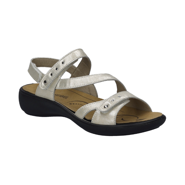 Women's Romika Ibiza 70 Backstrap Sandal in metallic silver with asymmetrical straps and removable footbed, ideal for lightweight summer wear.