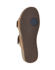 Brown wave pattern tread with blue circle JS logo at ball of foot.