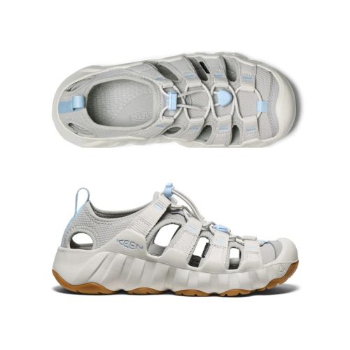 Pair of Fisherman Sandals in light grey with blue accents, white midsole and brown outsole with toe bumper. 