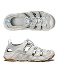 Pair of Fisherman Sandals in light grey with blue accents, white midsole and brown outsole with toe bumper. 