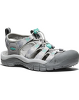 Grey fisherman sandals with aqua accents, bungee lace and treaded grey outsole with toe bumper.