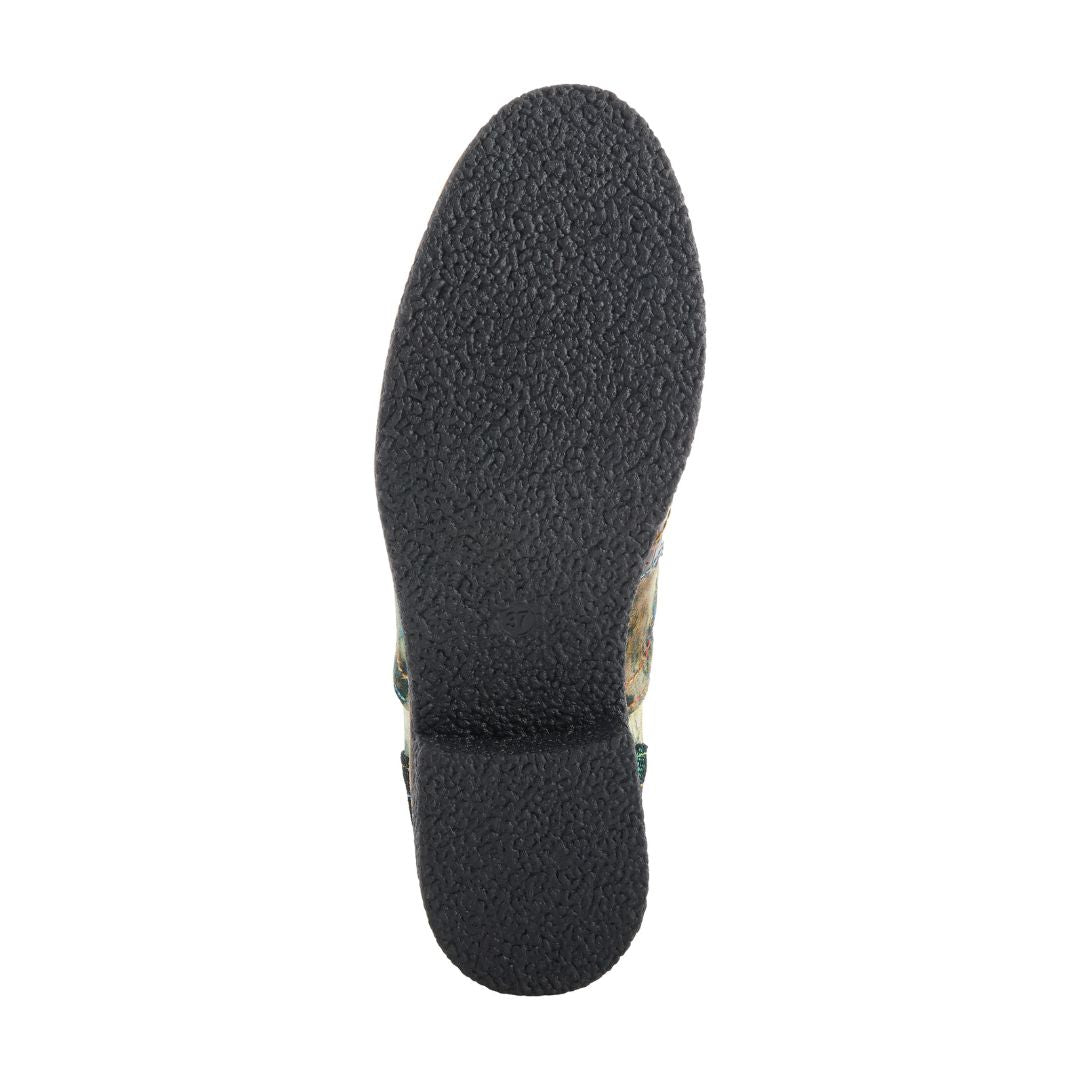 Black crepe rubber outsole of women's oxford shoe.