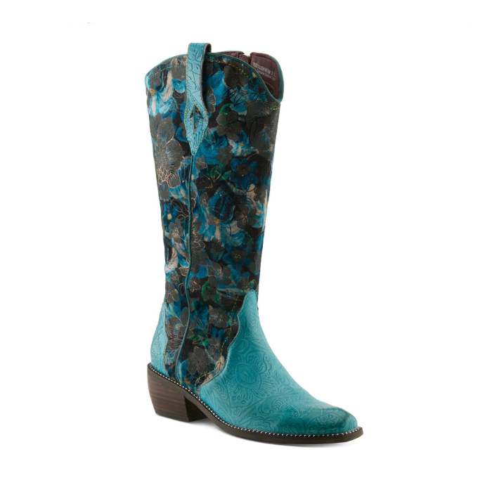 A tall western cowboy boot with a teal blue floral patterned shaft and a solid teal blue embossed leather vamp with silver studded wrap detail and low block heel.