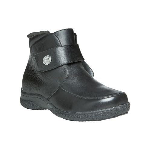 A black ankle boot with leather upper, an adjustable Velcro closure, and a black rubber outsole.