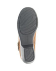 Black light treaded outsole of low heel ankle boot with Propet logo stamped in middle.