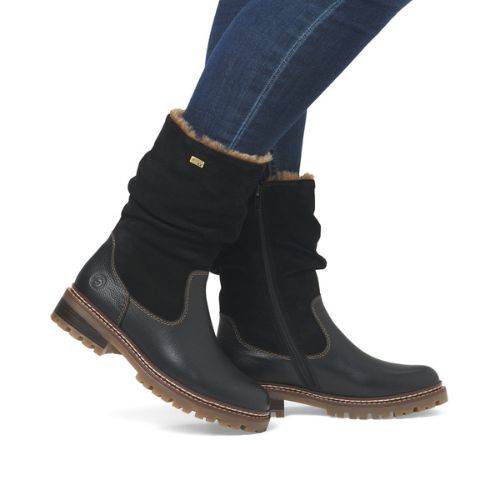 Black Remonte D0B80 women's winter boots worn with jeans, highlighting mid-calf fit, waterproof design, and cozy lining.