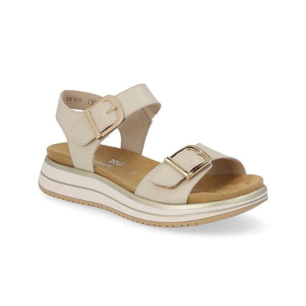 Beige Remonte back strap sandal with adjustable ankle strap and gold buckles.
