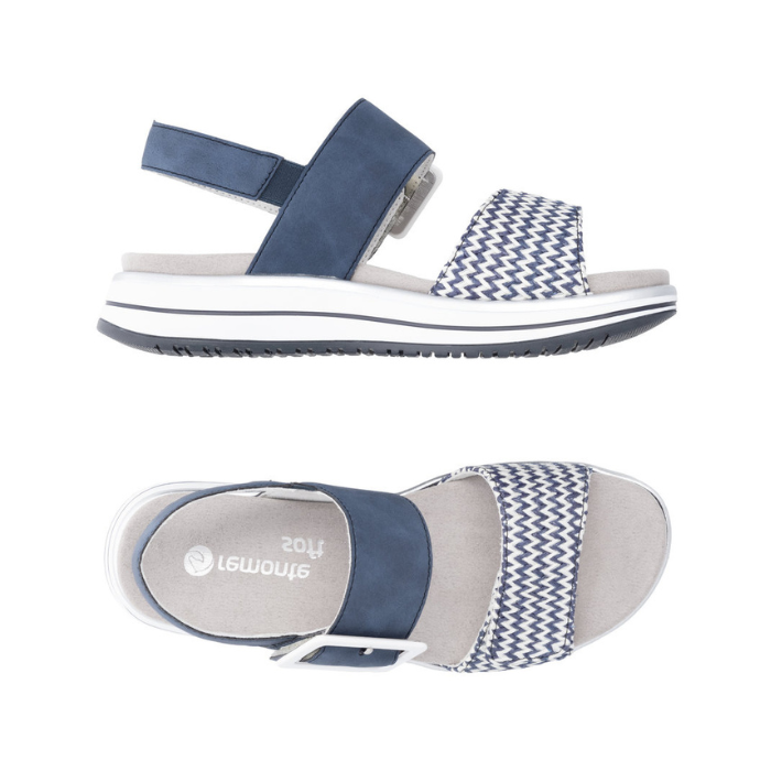 Pair of Navy and white backstrap sandals with a zig-zag striped strap and white square buckle on white and blue striped platform outsole.