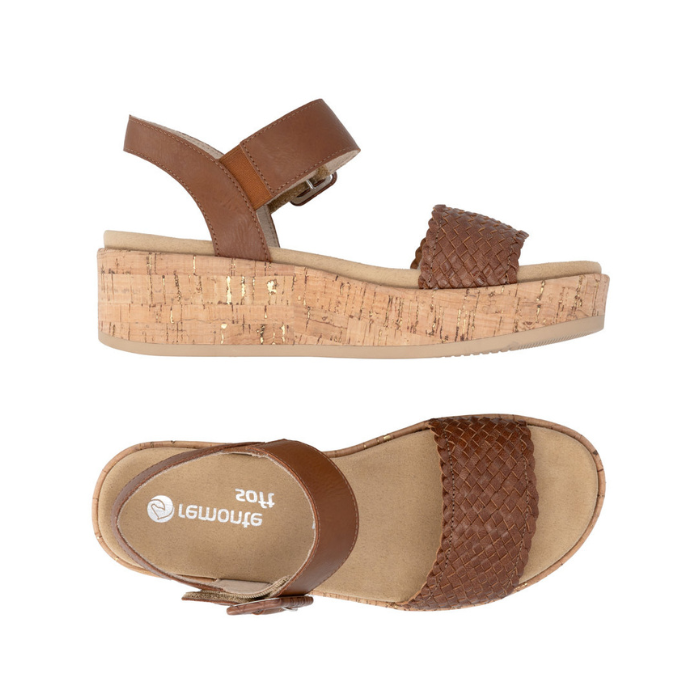 Pair of Brown wedge sandals with  black woven toe strap, buckled back strap, tan Remonte logo's footbed, faux cork midsole and tan outsole.