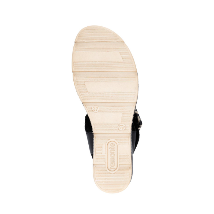 Off-white light treaded outsole with Remonte logo on heel.