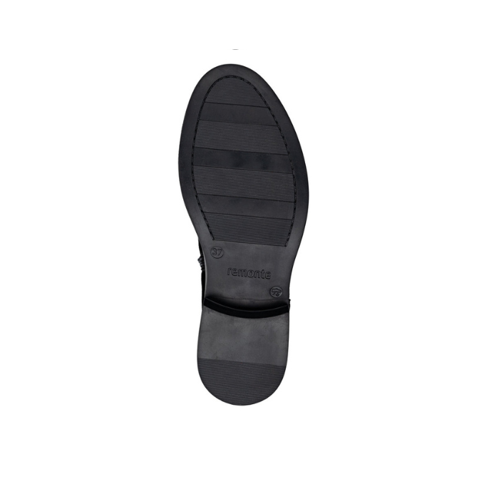 Black light treaded outsole with Remote logo stamped in middle.
