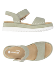 Pair of Green backstrap sandals with beige buckle detail. accent "X" stitching, tan Remonte logo'd footbed and white outsole.