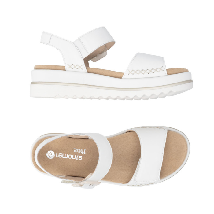 Pair of White backstrap sandals with beige buckle detail. accent "X" stitching, tan Remonte logo'd footbed and white outsole.