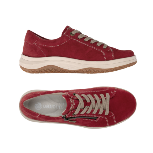 A pair of red suede sneakers with a side zipper, beige laces, grey Remonte logo'd footbed, white accent stitching, cream midsole, and a brown tan outsole.