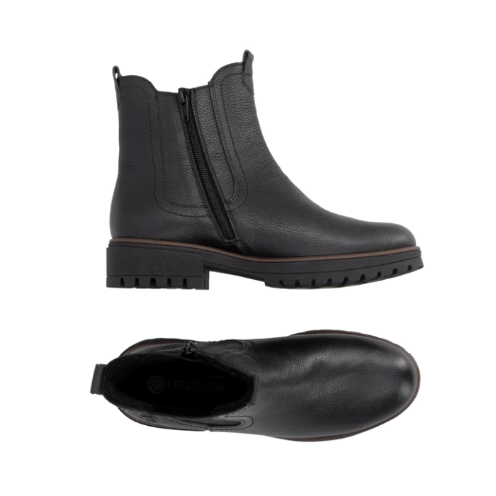 Pair of black pebbled leather Chelsea boots with a black inside zipper and a chunky black lug outsole.