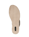 Zig-zag pattern tread on wedge sandal with green Remonte logo on heel.