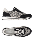Pair of Black and white woven upper sneaker with faux suede black accents, white laces and lining, grey Remonte logo'd footbed and a white midsole with black line through it.
