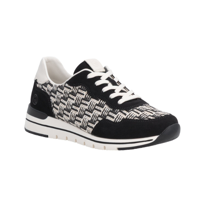 Black and white woven upper sneaker with faux suede black accents, white laces and lining and a white midsole with black line through it.