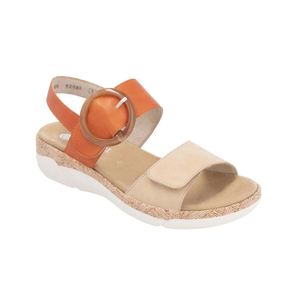 Rieker R6853 Backstrap Sandal in tan and orange with large round buckle, designed for comfort, flexibility, and summer style.