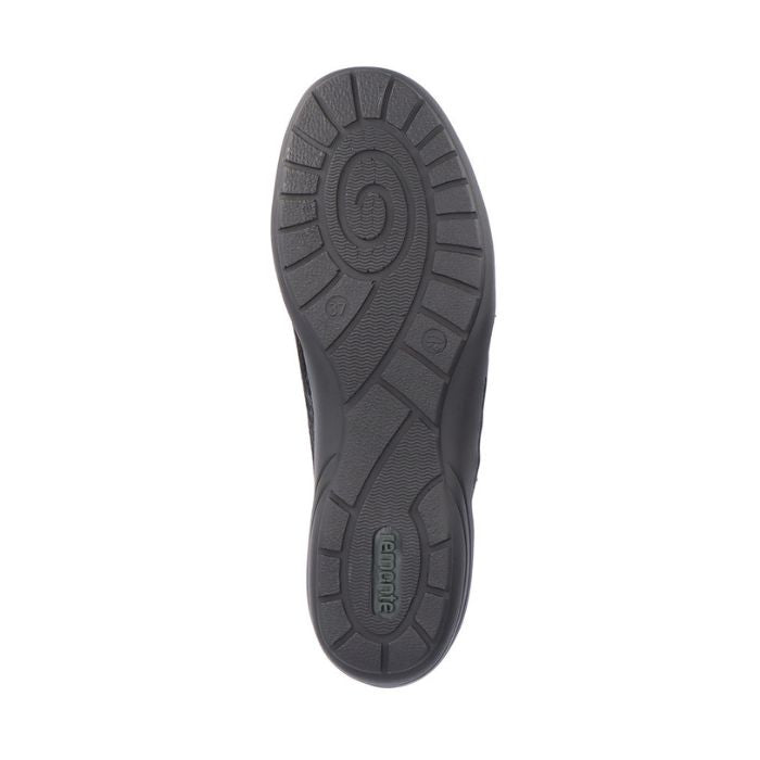 Black rubber outsole of women&#39;s shoe with green Remonte logo on heel.
