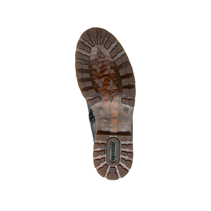 Brown lugged outsole, slightly translucent with green Remonte logo on heel.