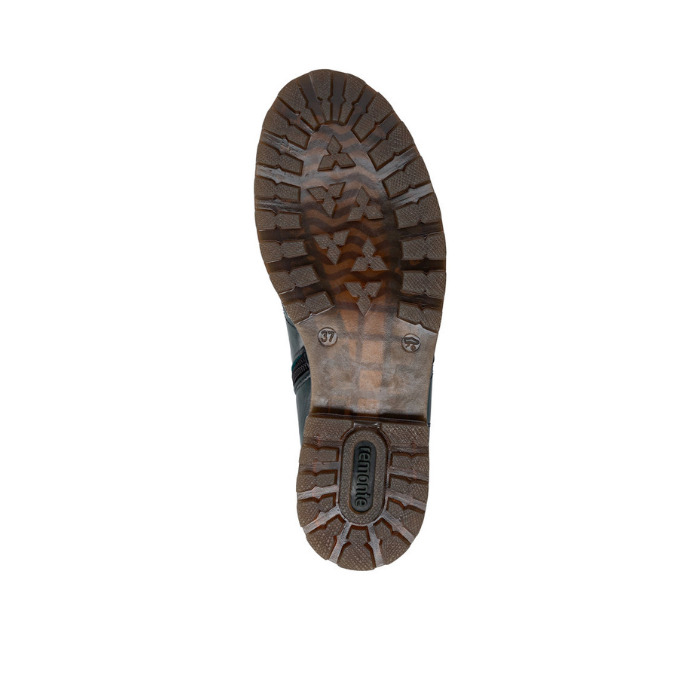 Brown lugged slightly translucent outsole with green Remonte logo on heel.