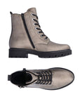Gold l leather combat style boots with black laces, black lugged outsole and black outside zipper.