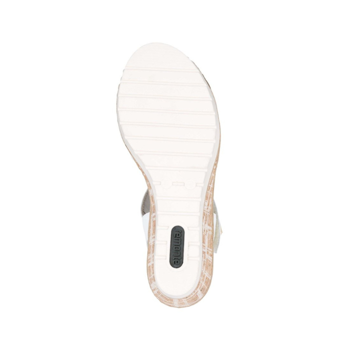 White light treaded outsole with green Remonte logo on heel.