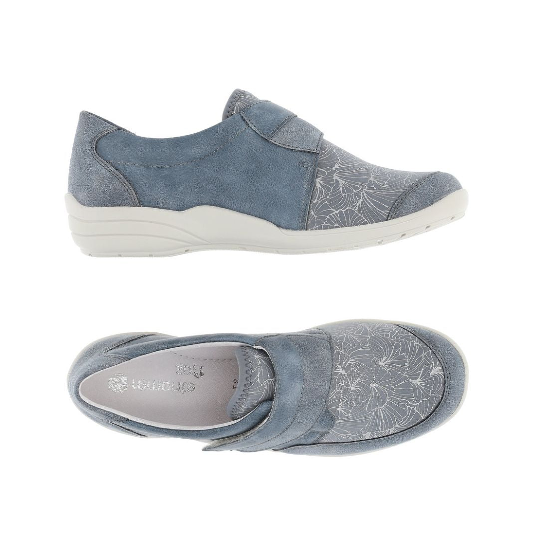 Side and top view of blue Women&#39;s Remonte R7600 Velcro Shoe with floral stretch fabric and supportive slip-on design.