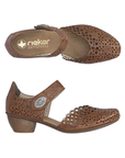 Pair of brown heeled open sided Mary-Janes with Velcro ankle strap, floral pattern, decorative perforations and a low stacked heel.
