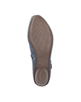 Brown outsole of heeled shoe with light tread and Rieker logo on heel.