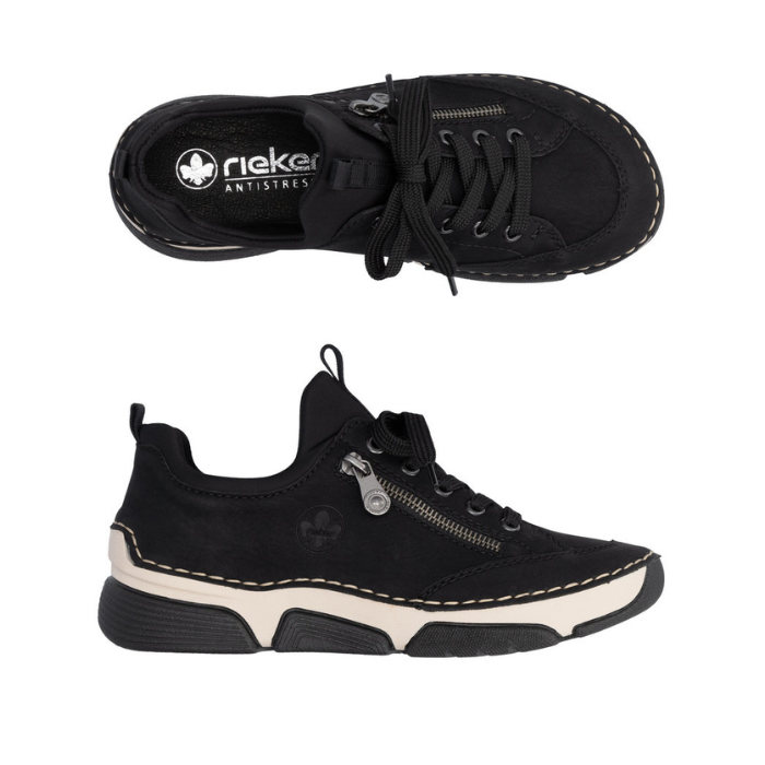 Pair of Black sneakers with faux side zipper, black Rieker logo'd footbed, accent stitching above the thick white midsole and black outsole.