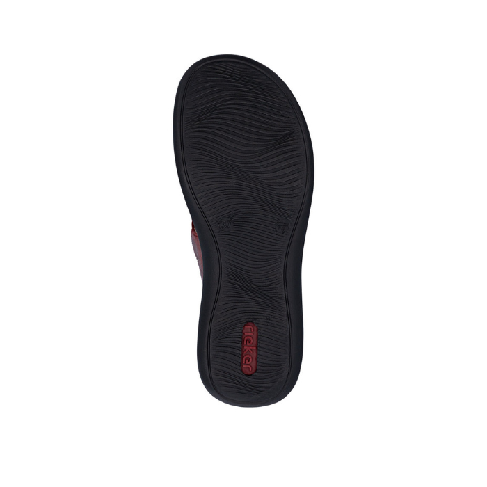 Black wave pattern tread on outsole with red Rieker logo on heel.