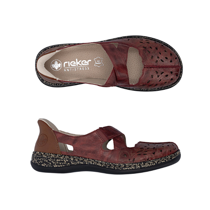Pair of Red Mary-Janes with crisscross straps, brown heel cap, floral details around perforations, tan Rieker logo'd footbed and a marbled black/tan midsole.