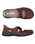 Pair of Red Mary-Janes with crisscross straps, brown heel cap, floral details around perforations, tan Rieker logo'd footbed and a marbled black/tan midsole.
