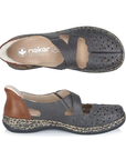 Pair of grey Mary-Janes with crisscross straps, brown heel cap, floral details around perforations, tan Rieker logo'd footbed and a marbled black/tan midsole.