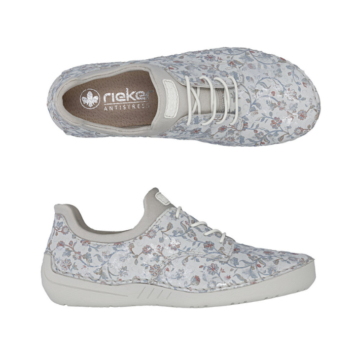 Pair of Grey sneakers with white elastic laces, pale floral pattern, tan Rieker logo'd footbed and grey outsole. 