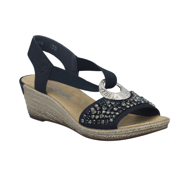 Navy slingback wedge sandal with  beaded embellishments, silver medallion, faux espadrille midsole and a tan Rieker logo'd footbed.