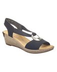 Black slingback faux espadrille wedge sandal with elastic side straps, silver medallion, tan Rieker logo'd footbed and brown outsole.