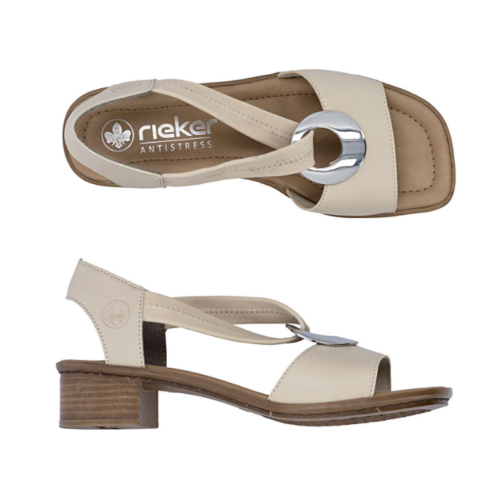 Pair of beige slingback leather sandal with metallic medallion, tan Rieker logo'd footbed and low block heel.