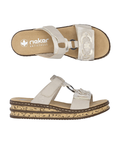 Pair of beige slide sandals with decorative embellishments, faux cork midsole, and tan Rieker logo'd footbed.