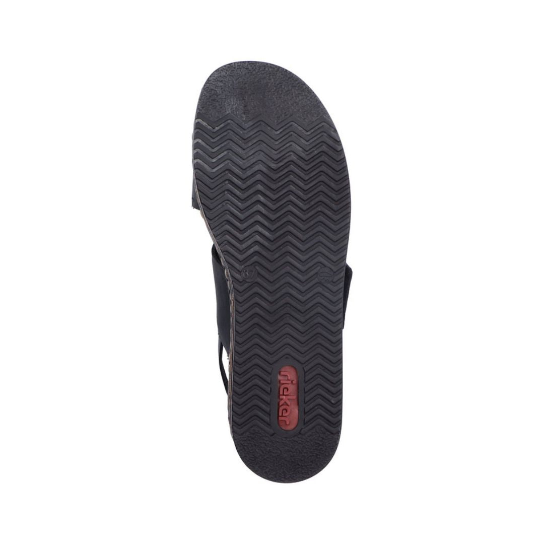 Wave pattern tread on black Rieker sandal outsole with logo on heel.