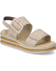 Beige Backstrap Sandal with a stylish buckle, two Velcro straps, tan Rieker logo'd footbed, faux cork layered midsole and beige outsole.