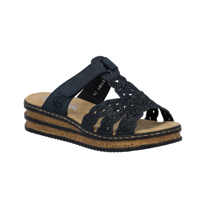 Navy slide sandal with sparkly upper, Velcro strap across vamp, tan Rieker logo'd footbed, and faux cord midsole.