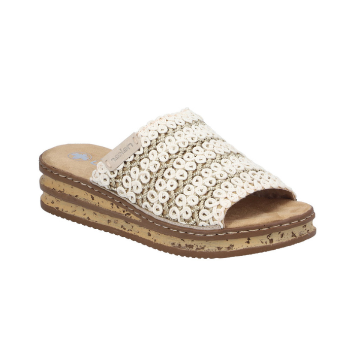 Off-white and beige platform slide sandal with woven band, faux cork midsole with dark brown line accents and a tan Rieker logo'd footbed.