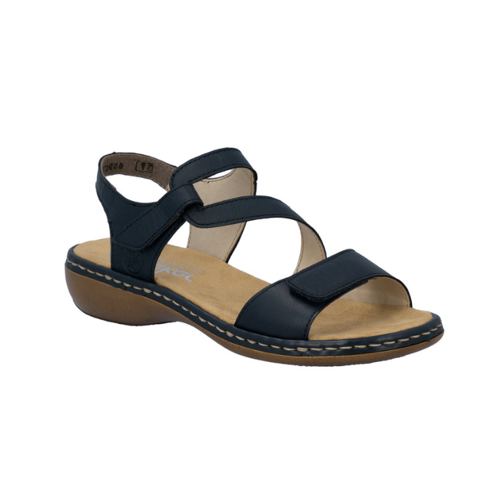 Navy leather sandal with looping Velcro straps, tan Rieker logo'd footbed and brown outsole.