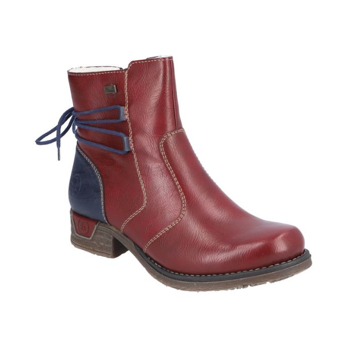 Red leather ankle boot with low heel, navy heel counter and navy lace detail on heel.